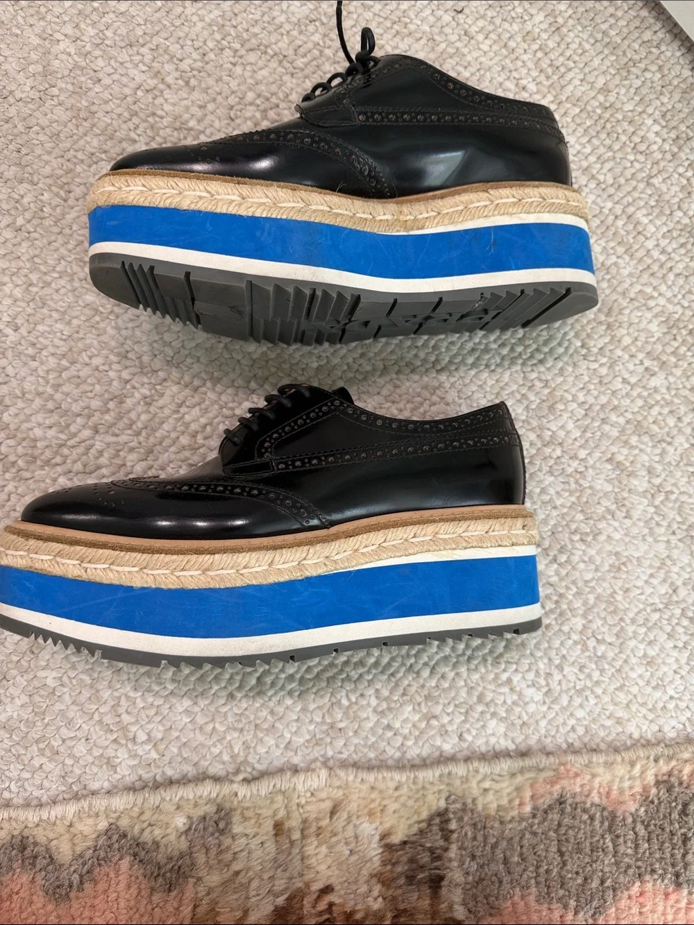 Prada Black Wingtip Lace-Up Brogues with Tan and Blue platform Sole